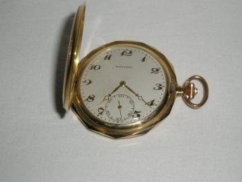 Zlaté kapesní hodinky Movado